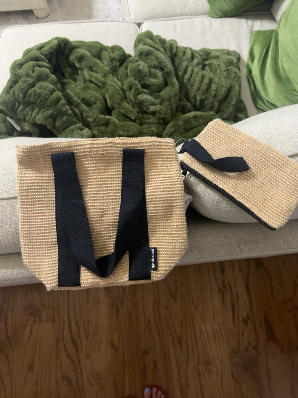 Woven straw Wristlet Clutch in Natural with Black Trim